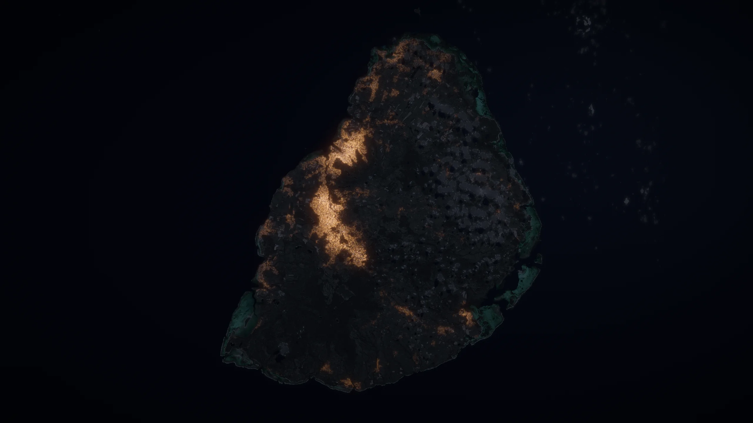 Mauritius at night, seen from above: the towns of Port Louis, Plaines Wilhems and Curepipe glow orange.